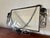 Rectangular mirror from the early 20th century Beveled wrought iron mirror suspended by a chain Decorated with metal...