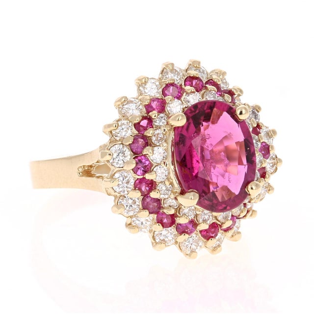 A colorful piece that is sure to elevate your accessory wardrobe! This beauty has an Oval Cut Pink Tourmaline set in the...