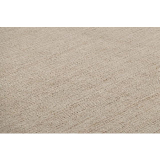 This 11x20 contemporary rug is the newest addition to the Rug & Kilim Textural Collection, with an inventive take on solid...