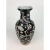 A blossom and branch motif in arabesque style decorate this vase with the symbols of prosperity, fortune, and happiness...