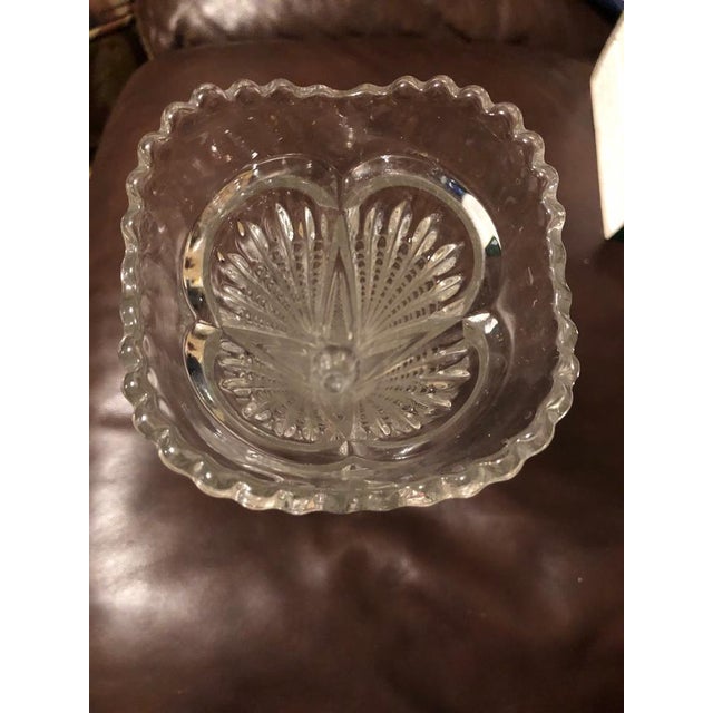 An exquisite turn-of-the-century Early American Pattern Glass (EAPG) trumpet vase, featuring the classic "Star and File"...