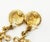 1990s Chanel Vintage Gold Plated Round CC Twisted Cross Long Clip on Earrings, A Pair For Sale - Image 5 of 5