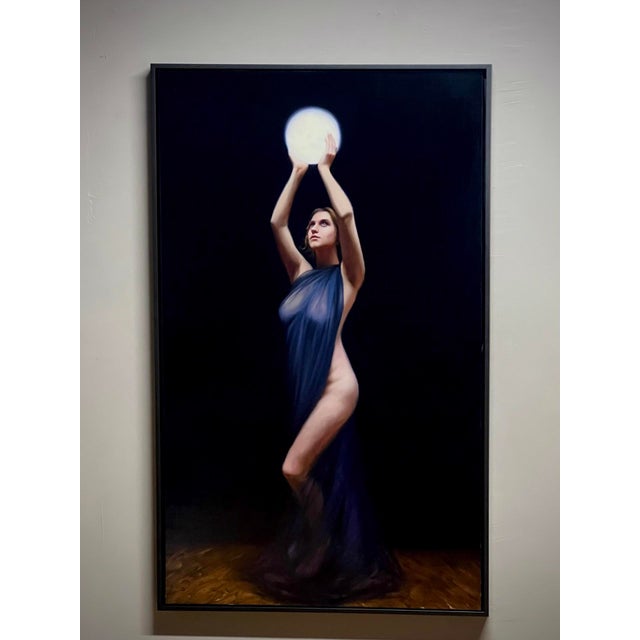 This oil on linen artwork features a figure draped in flowing fabric, gracefully raising a luminous orb above her head...