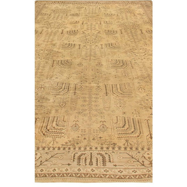 Imbued with quiet elegance and an air of noble refinement, this oversized antique Turkish Oushak rug from the 1920s exudes...