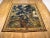 A Brussels verdure landscape tapestry from the 17th century, featuring a verdant landscape with stately and exotic trees...