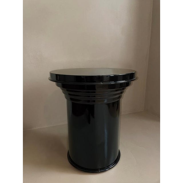 Rl 06 round side table in licorice glossy varnished aluminum by caspal dimensions: ø 38 x h 45 cm. Materials: varnished...