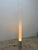 Tall tubular floor lamp designed by Pablo Pardo for Pablo. Its refined machined aluminum base combined with its towering...