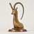 An incredible large brass gazelle or ibex bookend mounted on a wooden base. This stately long horn piece is a classing mid...