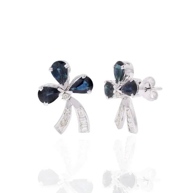 This is part of Chairish’s Fine Jewelry assortment. Studs create a subtle beauty while showcasing the colors of the...