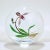 A very fine studio glass paperweight by Chris Buzzini. With a lampwork orchid (including the roots). With a signature cane...