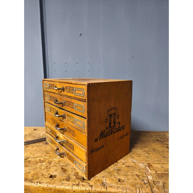 This thread storage unit made in the 1930s could have been used in a textile shop or general store. It has 6 drawers, each...