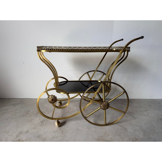 Hollywood Regency 1960s Italian Hollywood Regency Scrolled Brass & Black Glass Two-Tier Bar Cart For Sale - Image 3 of 14