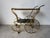 Hollywood Regency 1960s Italian Hollywood Regency Scrolled Brass & Black Glass Two-Tier Bar Cart For Sale - Image 3 of 14