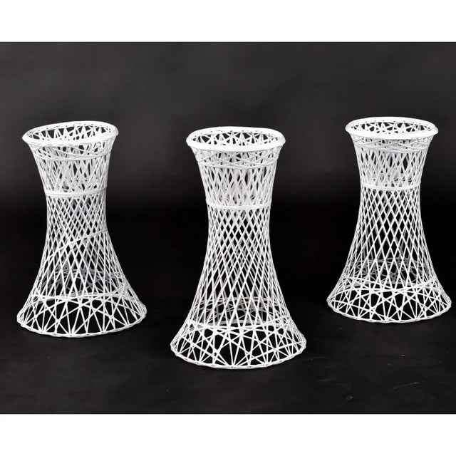 Rare opportunity to buy a stable of Russell Woodard vintage spun fiberglass planters. This group of 5 planters have been...