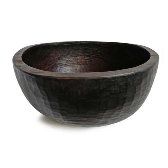 Large vintage wood bowl from Nepal. Rich ebony finish and original repair detail. Beautiful texture and form.