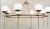 Original Retail $4240, stylish Currey & Co. Modern Satin Brass Finished Montview Chandelier, eight frosted glass globes,...