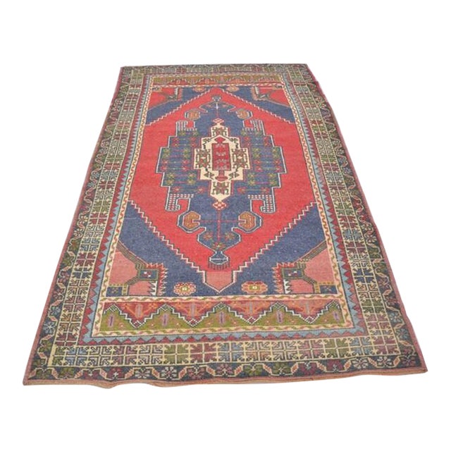 Handwoven Vintage Oushak With Faded Geometric Medallion For Sale
