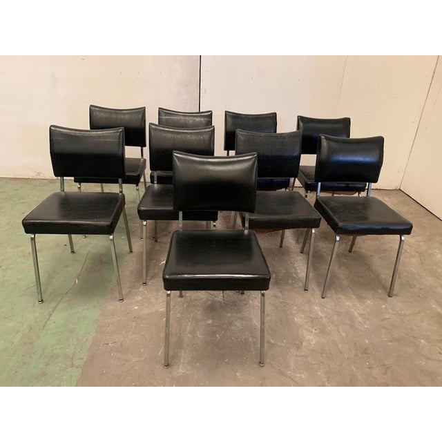 Set of nine vintage chairs Chrome-plated square tube legs Black faux leather upholstery Good condition Dimensions: H 81 x...