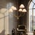 Textile Aloadecor French Modern Warm Brass Curved Staggered Chandelier With White Fabric Shades For Sale - Image 7 of 8