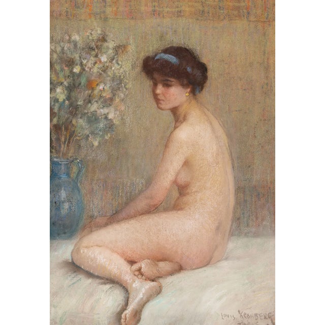 Louis Kronberg (1872-1965) American A beautiful pastel of a seated nude in an interior setting by this highly esteemed...
