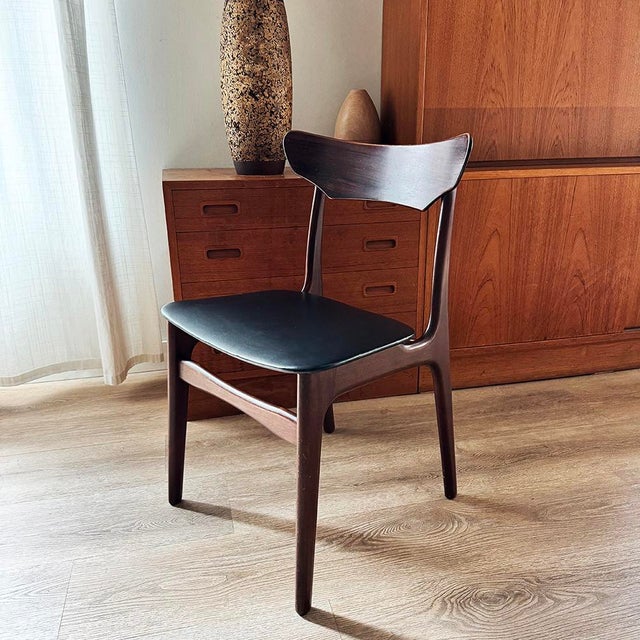 Here we have for you an exquisite Mid-Century Modern dining chair designed by Schiønning & Elgaard and produced by Randers...