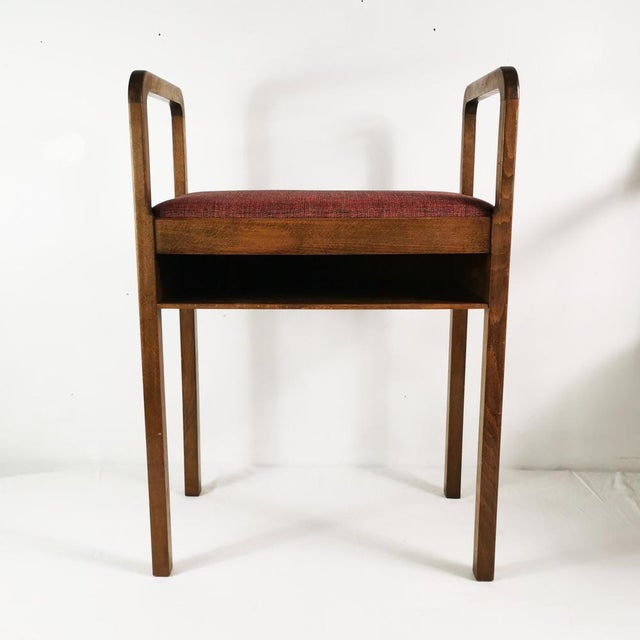 This chair comes from Denmark in the 1940s. It features a simple, spacious form. Made of beech wood with fabric...