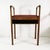 This chair comes from Denmark in the 1940s. It features a simple, spacious form. Made of beech wood with fabric...