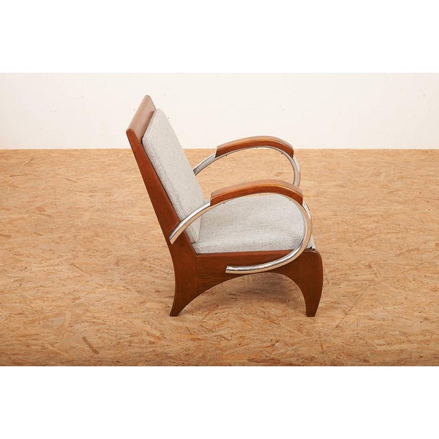 Upholstered Armchair in Wood, Plywood, Chrome-Plated Tubular Steel with Volz Cushion, in Restored conditions. Designed...