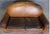 All leather two seat sofa with rounded lines throughout. Deep seats with fully cushioned arms. Please confirm location...