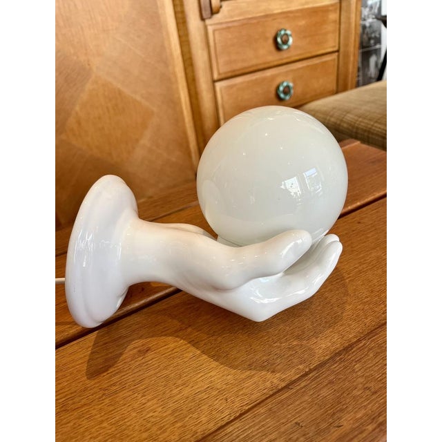 Hand-shaped wall light from the 1970s Up to 250V (Europe/UK Standard).The wiring of this item may be original and might...