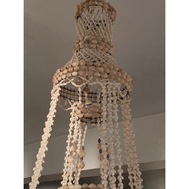 A fabulous large Seashell chandelier / Hanging Plant Holder. It's old but in fantastic condition. Made up of hundreds of...