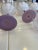 These goblets appear or look similar to lotus flowers. They are violet and different tones of violet five of them in total...