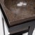 Ideal indoors or out, this clean-lined side table is comprised of a square puddingstone top elevated by a powder-coated...