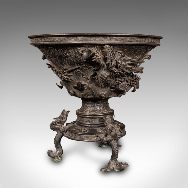 This is an antique censer bowl. A Japanese, bronze incense burner with dragon motif, dating to the early Victorian period,...