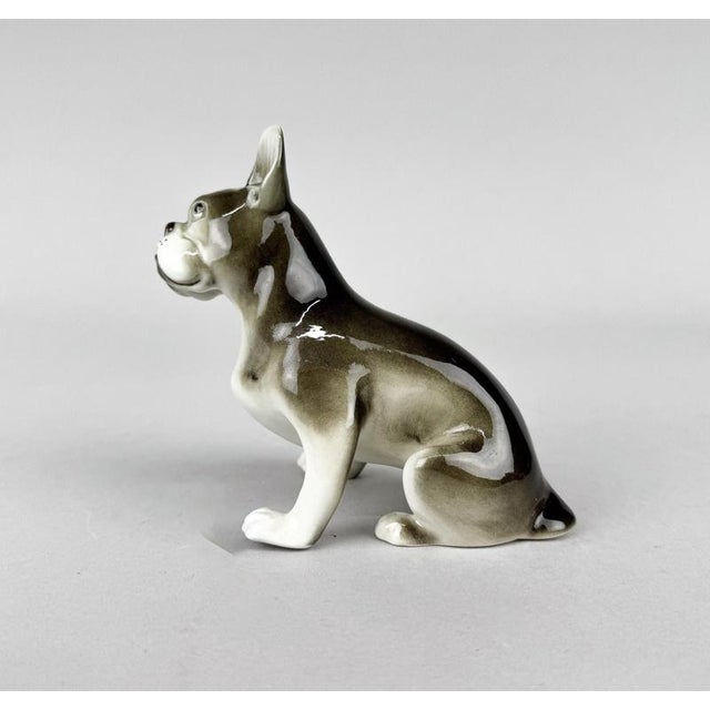 Porcelain statue of French bulldog, produced by Royal Dux in the 1960's in former Czechoslovakia. This piece is attributed...
