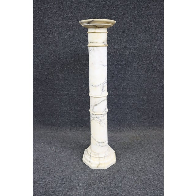 Italian white marble carved pedestal.