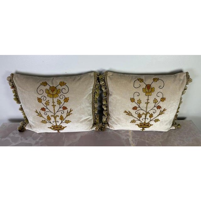 This exquisite pair of custom decorative pillows showcases finely preserved 19th century appliqués, meticulously hand-sewn...