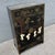 This vintage Chinese black lacquer cabinet showcases exquisite hand-painted decoration inspired by traditional Asian...