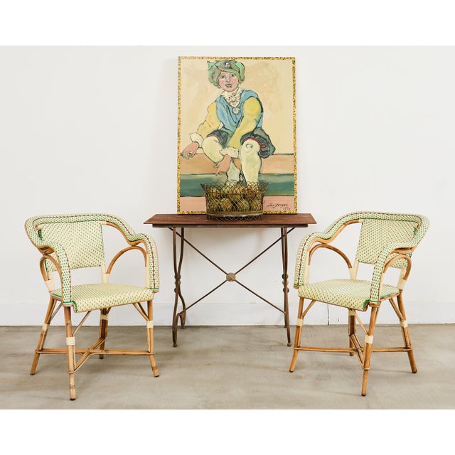 Weathered French early 20th century art nouveau iron patio and garden dining or bistro table. The table features a...