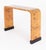 An elegant Art Deco console table of striking architectural form, beautifully crafted and raised upon bold ebonised plinth...