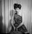 Leopard Lady A young woman in a Tarzan-style leopard print off-the-shoulder dress, circa 1955. (Photo by Graphic...
