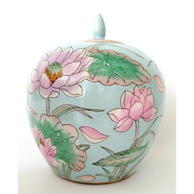 Offering a rare vintage Chinese porcelain ceramic ginger jar, circa Mid 20th Century. This porcelain jar has a light blue...