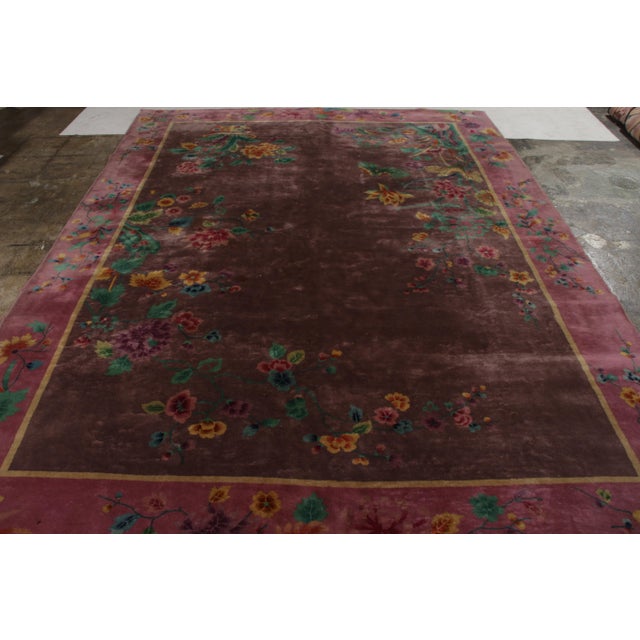Made with hand-knotted wool and originating from China circa 1920-1930, this is a 9x11 rare collectible from the 1920s...