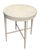 This charming vintage accent table brings classic French Provincial elegance and soft, artisanal detail into any room....