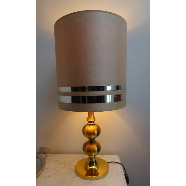 Gilded Ball Table Lamp by Boulanger from Boulanger, 1970s, in Very Good conditions. Designed 1970 to 1979 This piece has...