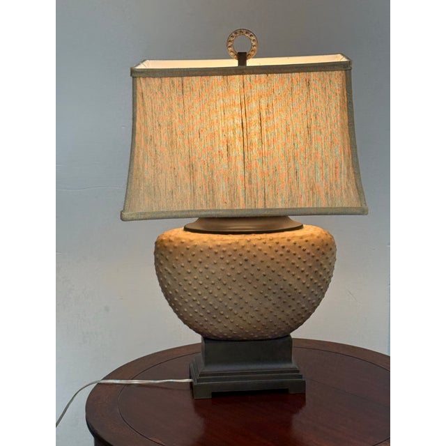 Design Plus Gallery presents the Cumberland Sandstone Table Lamp from Uttermost. The lamp has a rounded sandstone-toned...