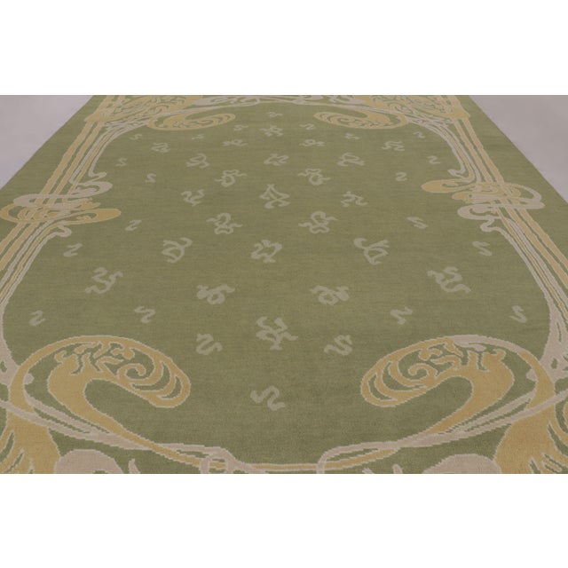 This 11x14 rug by Rug & Kilim is an exciting reimagining of an extremely rare turn-of-the-century antique Art Nouveau rug...