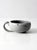 This vintage handmade studio pottery mug features a low, wide profile that gives it a distinctive look. The pale gray...