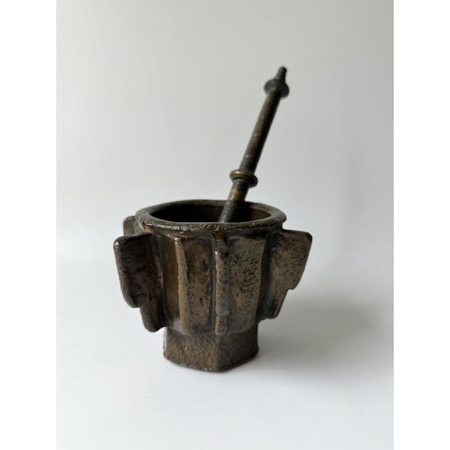 Antique - Heavy Bronze Mortar and Pestle Details: Heavy cast bronze mortar and pestle set with prominent ribs around the...