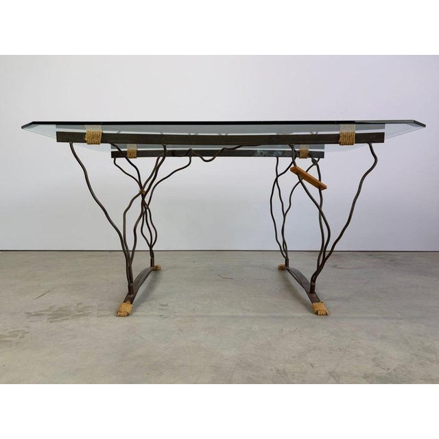 Organic wrougt iron, cord and glass dining table by a dutch Artist. The table has the artists's engraving. Beautiful and...